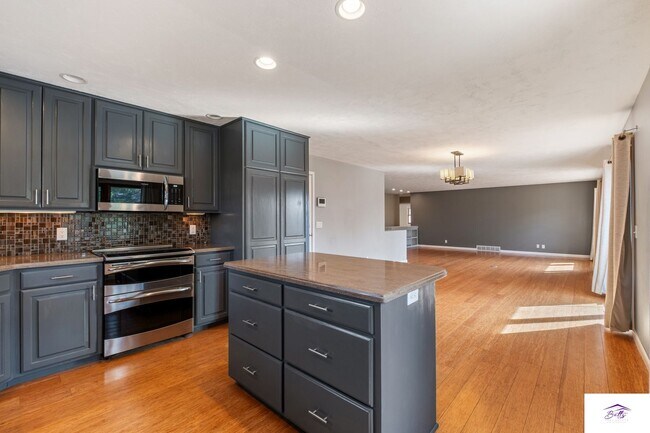 Building Photo - Available now! Spacious 3 Bed, 3 Bath Home with Modern Open Layout & Lawn Care Included