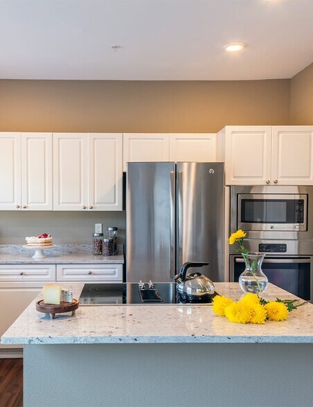 Kitchens feature custom touches like kitchen islands and breakfast bars - Boulder Creek