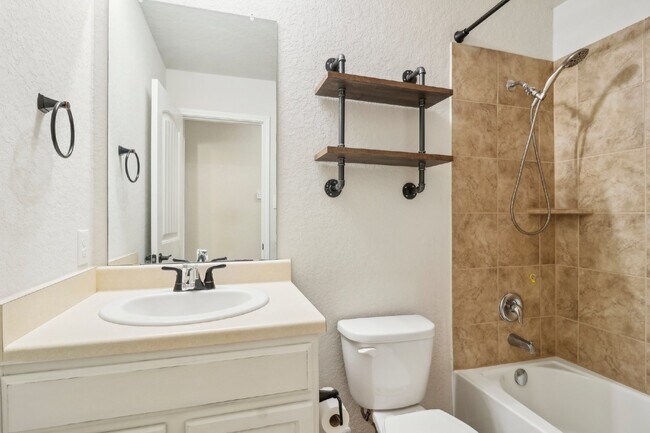 Building Photo - "Charming 4-Bedroom Oasis with custom fini...