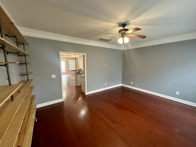 main living area with built in shelves - 8608 Gauphin Pl