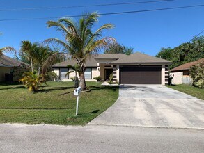 Building Photo - 4 Bedroom 2 bath CBS House with 2 car garage
