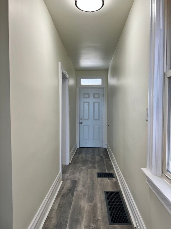 Building Photo - Updated 3BR house with multi-car off street parking!