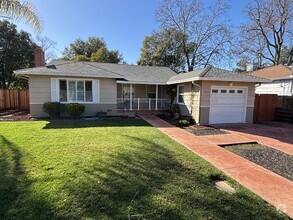 Building Photo - "Charming 3-Bed Home with Modern Granite F...