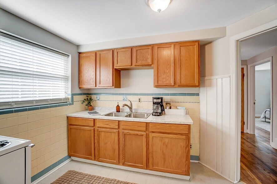 Kitchen has character and charm with original mid century tile - 531 Norway Ave