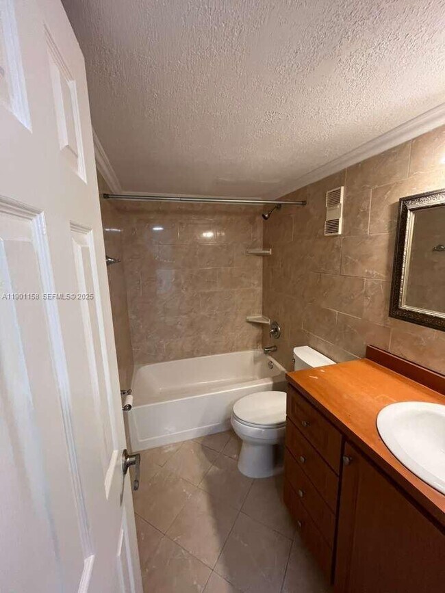 Building Photo - 8740 N Sherman Cir