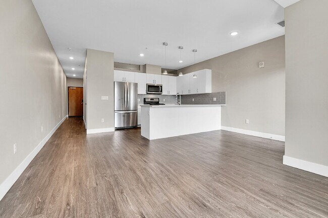 Building Photo - $1,540.95 - 1 Bed, 1 Bath Condo with In Unit Laundry in a Secured Building with an Elevator!