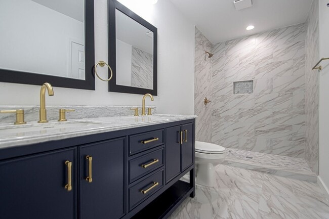 Building Photo - Large Open-Concept 4 Bedroom with Stunning Pond Views!