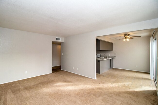 Kitchen nook opens into large family area - 4721 N Cedar Ave