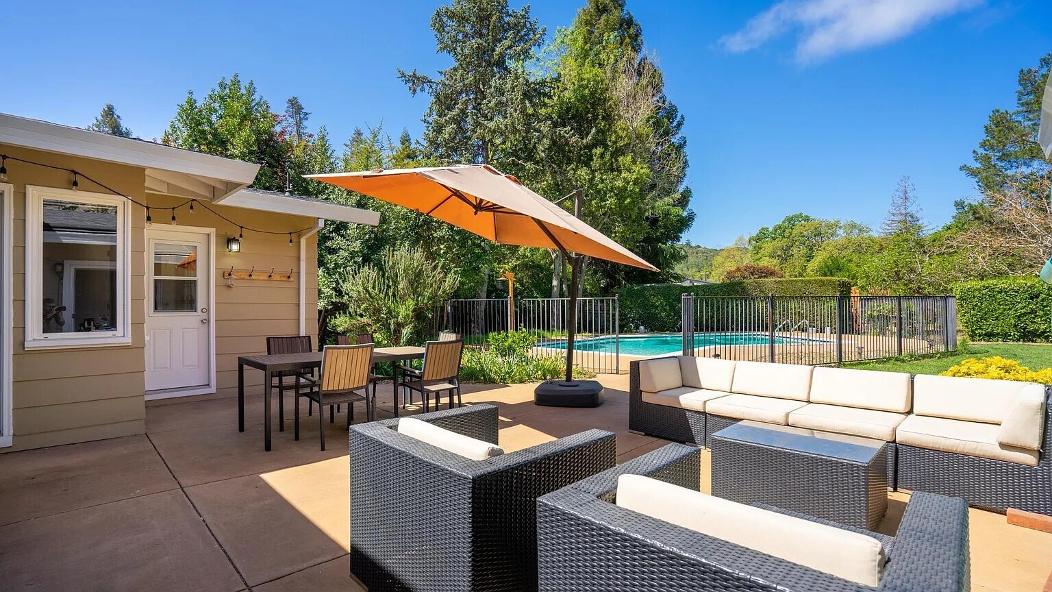 Patio and backyard. The pool fence has been removed. - 1415 Butterfield Rd