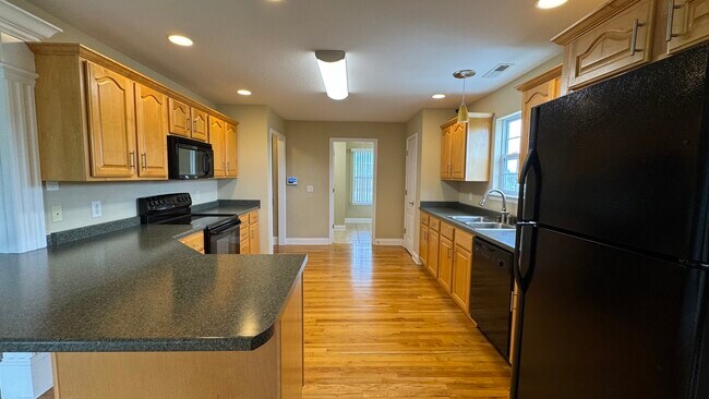 Building Photo - 5685 Hyacinth Ln