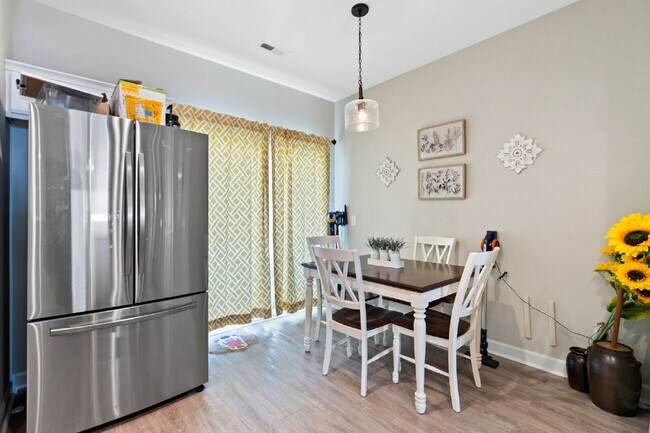 Building Photo - Available Now! Enjoy low-maintenance coastal living in this beautiful 2-bedroom, 2.5-bath townhom...