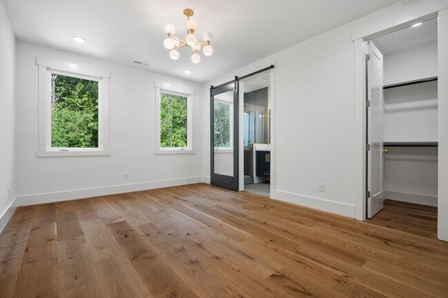 Building Photo - Modern 4-bedroom, 4-bathroom Custom Home D...