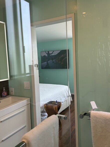 View from shower where you can watch your TV from the bedroom - 8530 Holloway Dr