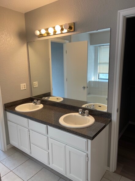 master bedroom vanity - 1309 Grand Mnr