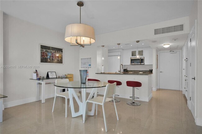 Building Photo - 10275 Collins Ave