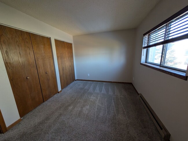 Building Photo - For Rent: Unfurnished 2 Bedroom 2 Bath Condo