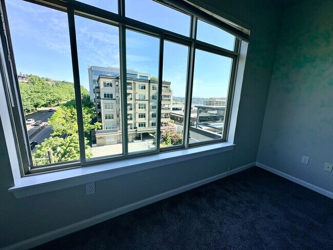 Building Photo - Top-Floor 2BR with Lake Union Views + Garage Parking + Internet Included!