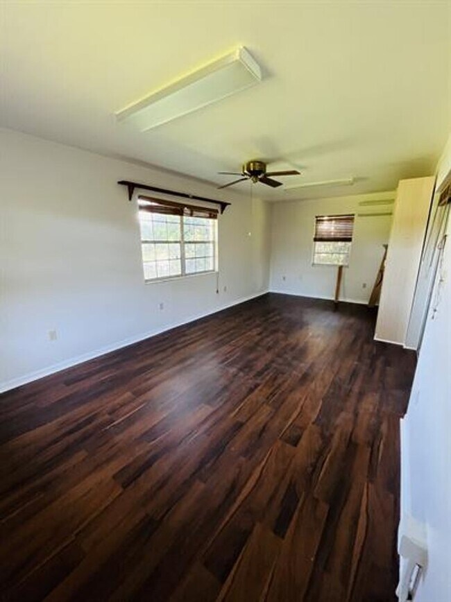 Building Photo - Eustis Lake Front Home with 2 Primary Bedr...
