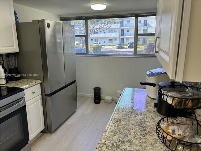 Building Photo - 8310 Sands Point Blvd