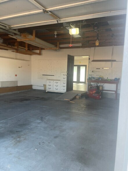 Garage with ramp into house - 240 W Kyle Dr