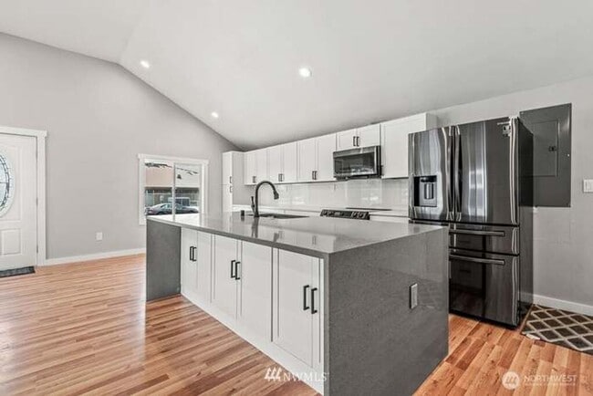 Building Photo - Remodeled open concept home with shop!