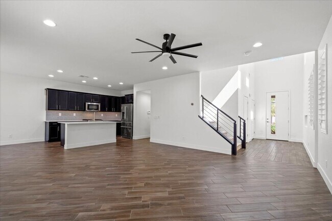 Building Photo - Modern Gated 3 Bedroom Retreat with Loft & Entertainer’s Backyard