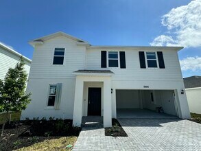Building Photo - 10856 NW Everbreeze Dr