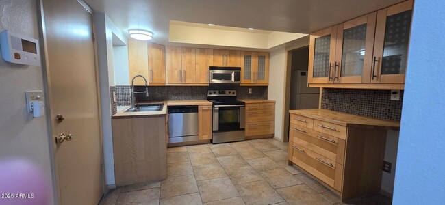 Building Photo - 7744 E Camelback Rd