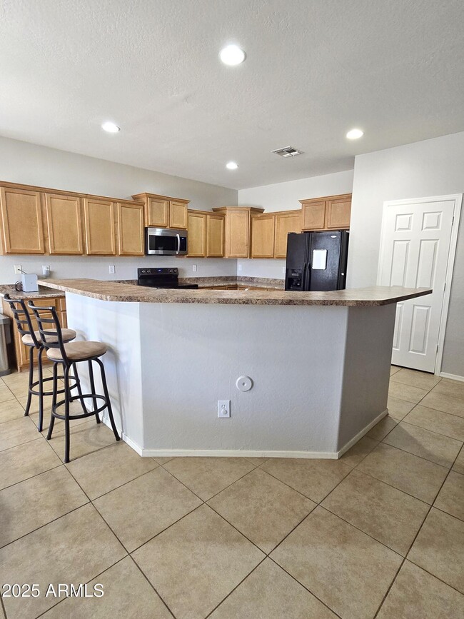 Building Photo - 18014 W Carmen Dr