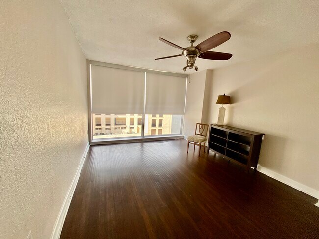 Large floor to ceiling windows with blackout blinds give nice view...or not. - 470 3rd St S