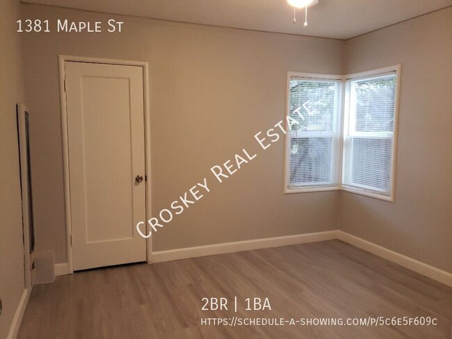 Building Photo - Remodeled unit, close to schools, easy acc...