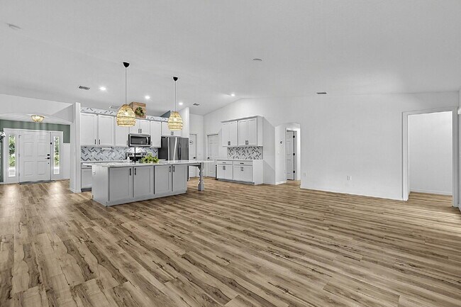 Building Photo - Modern 4-Bedroom, 3-Bath Home with Private In-Law Suite – Palm Coast, FL