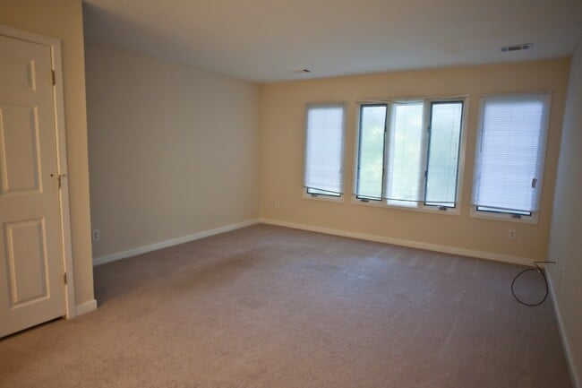 Building Photo - Live close to campus!