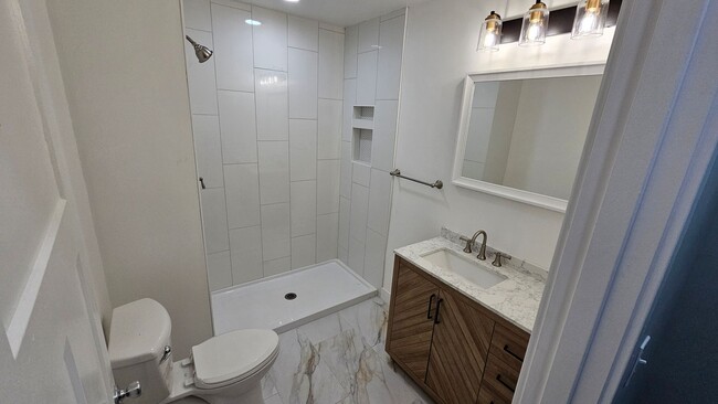 Building Photo - Stunning Renovation Ready for Your Finishing Touches!