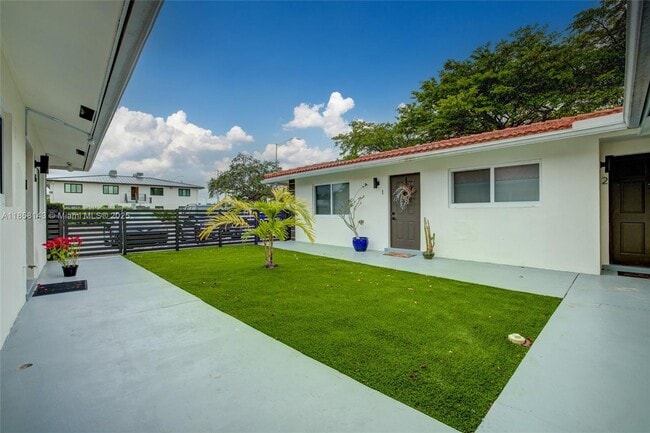 Building Photo - 1750 NE 56th Ct