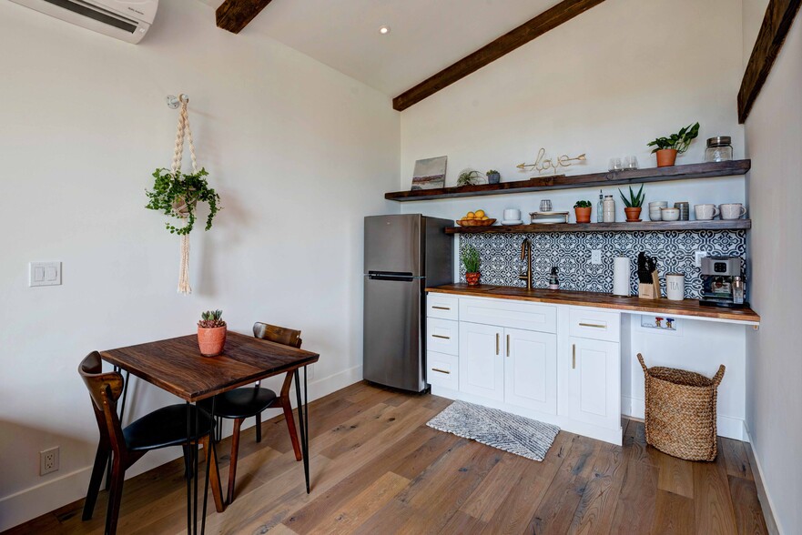 There is a washer dryer (now) under the countertop where you see the basket. - 2820 Panorama Dr