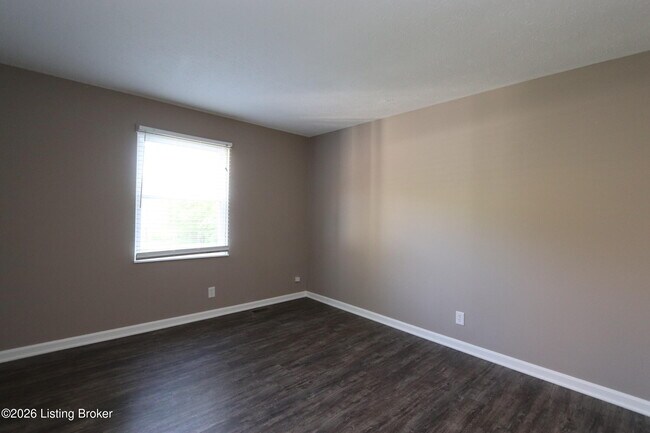 Building Photo - 6810 Village Green Blvd