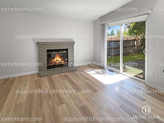 Building Photo - "Charming 3-Bedroom Retreat with Cozy Fire...