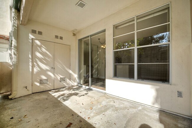 Building Photo - Coastal Living at Its Best – Upgraded 1BR Condo with Private Patio & Resort-Style Amenities