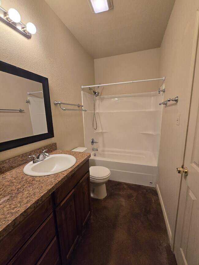 Building Photo - "Charming 3-Bedroom Duplex Retreat on Mandy