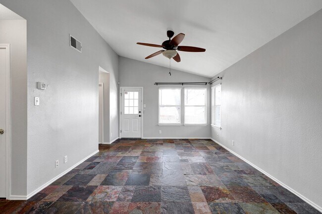Building Photo - Carpet-Free Home with High Ceilings & Outdoor Retreat