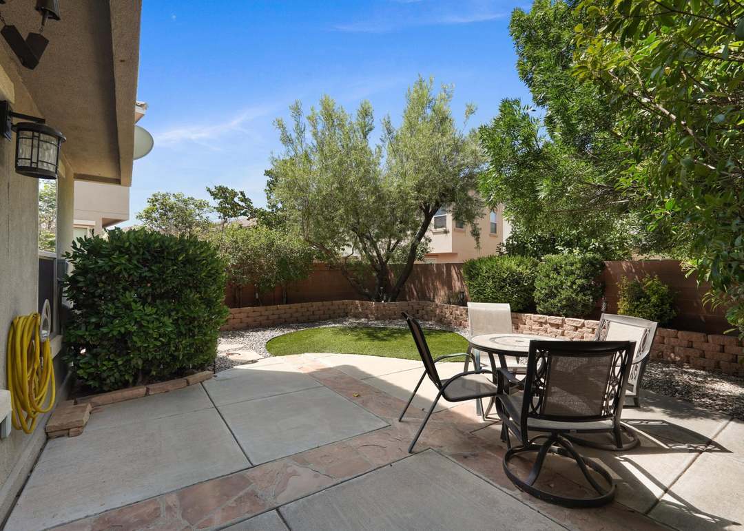 Landscaped yard with drip irrigation - 10824 Arguello Trl NE