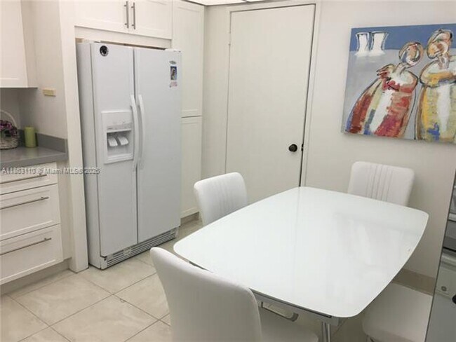 Building Photo - 20191 E Country Club Dr