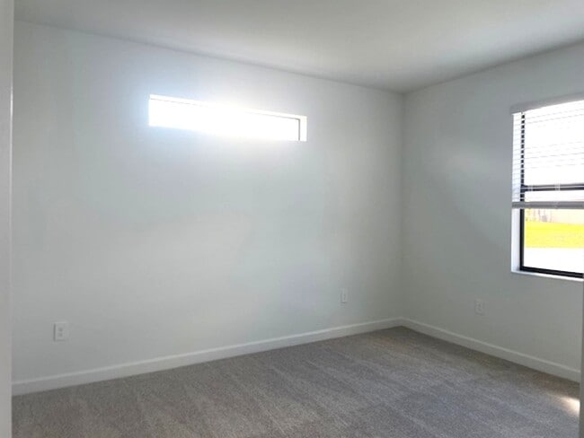 Building Photo - New Construction 2 Bedroom PLUS a Home Office Available in Lorraine Lakes