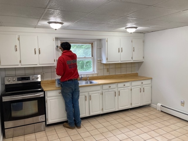 large eat-in kitchen with tile floor and backsplash - 152 Main Street