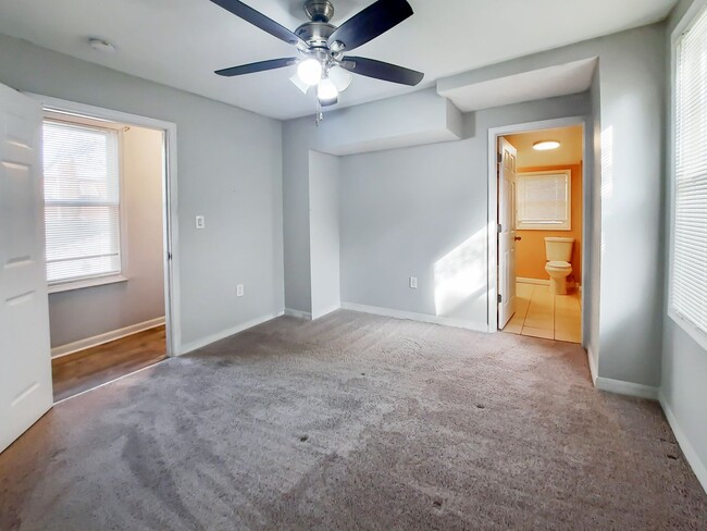 Building Photo - Upgraded 4BR/2.5BA SFH with 1st fl BR. Nea...