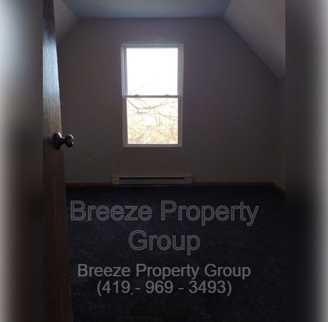 Building Photo - 205 W Chalmers Ave