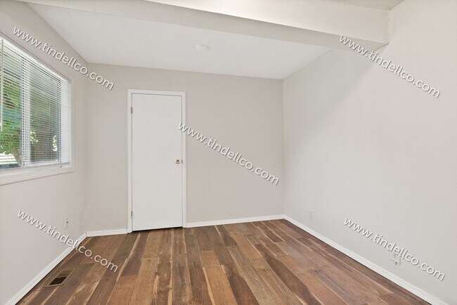 Building Photo - Darling Two Bedroom With Large Fenced Yard...