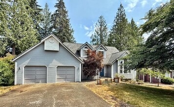 Building Photo - 1128 NW Thornwood Cir