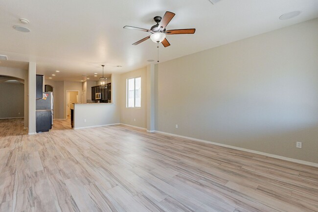 Building Photo - Four Bedrooms, 3 Car Garage - New flooring!